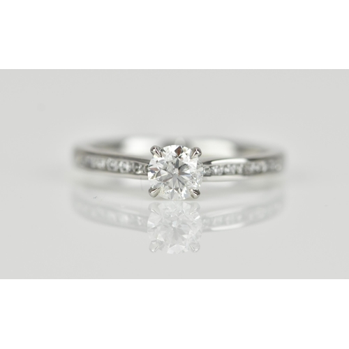 286 - A platinum and solitaire diamond engagement ring, designed with central brilliant cut stone approx. ... 