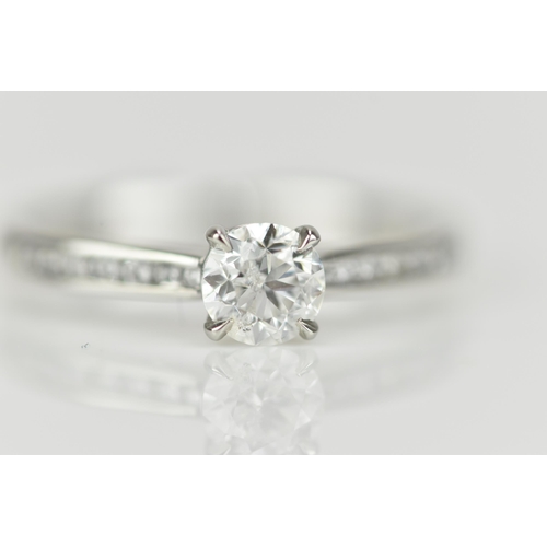 286 - A platinum and solitaire diamond engagement ring, designed with central brilliant cut stone approx. ... 