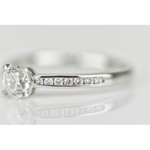 286 - A platinum and solitaire diamond engagement ring, designed with central brilliant cut stone approx. ... 