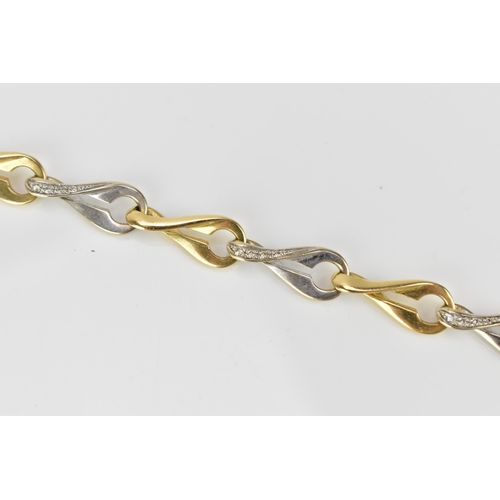 289 - An 18ct yellow and white gold and diamond set bracelet, with interlaced links, the white gold ones s... 