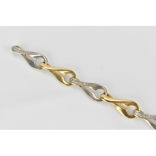 289 - An 18ct yellow and white gold and diamond set bracelet, with interlaced links, the white gold ones s... 