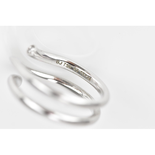 296 - Georg Jensen- An 18ct white gold and diamond 'magic' ring, designed by Regitze Overgaard, with a dia... 