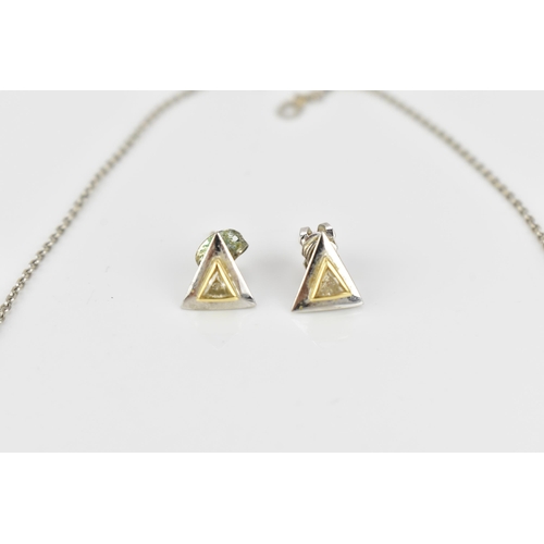 300 - An 18ct white gold, yellow gold and diamond pendant on chain, with matching earrings, the pendant an... 