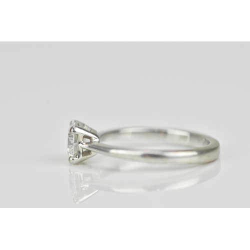 301 - An 18ct white gold and diamond solitaire ring, with central round brilliant cut stone approx 0.87 ca... 