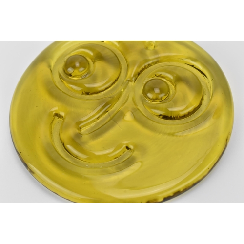 9A - A rare Whitefriars glass smiley face suncatcher, designed by Alfred Fisher, in translucent yellow gl... 