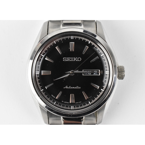 20 - A Seiko, automatic, gents, stainless steel wristwatch, circa 2017, model 4R36-03H0, having a black d... 