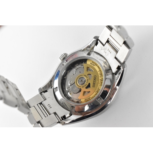 20 - A Seiko, automatic, gents, stainless steel wristwatch, circa 2017, model 4R36-03H0, having a black d... 