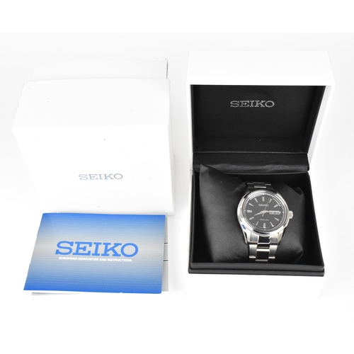 20 - A Seiko, automatic, gents, stainless steel wristwatch, circa 2017, model 4R36-03H0, having a black d... 