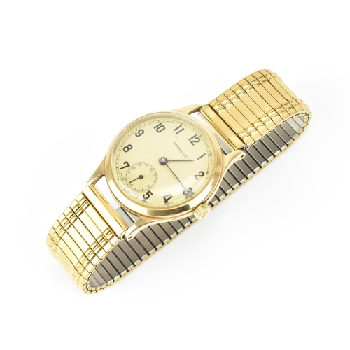 36 - A Garrard, manual wind, gents, 9ct gold wristwatch, the dial having Arabic numerals and subsidiary s... 