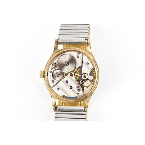 36 - A Garrard, manual wind, gents, 9ct gold wristwatch, the dial having Arabic numerals and subsidiary s... 