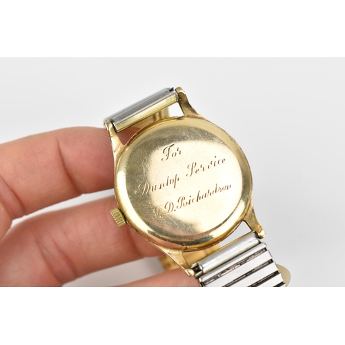 36 - A Garrard, manual wind, gents, 9ct gold wristwatch, the dial having Arabic numerals and subsidiary s... 