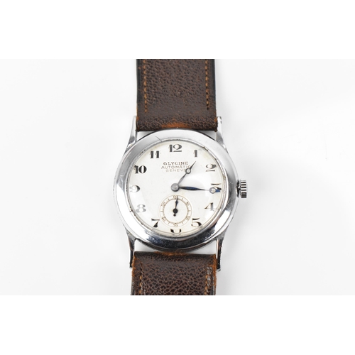 48 - A Glycine, automatic, mid size, stainless steel wristwatch, having a white dial with Arabic numerals... 