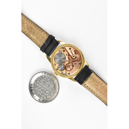 31 - An Omega, manual wind, gents, gold plated wristwatch, circa 1959, having a white dial with gilt Arab... 