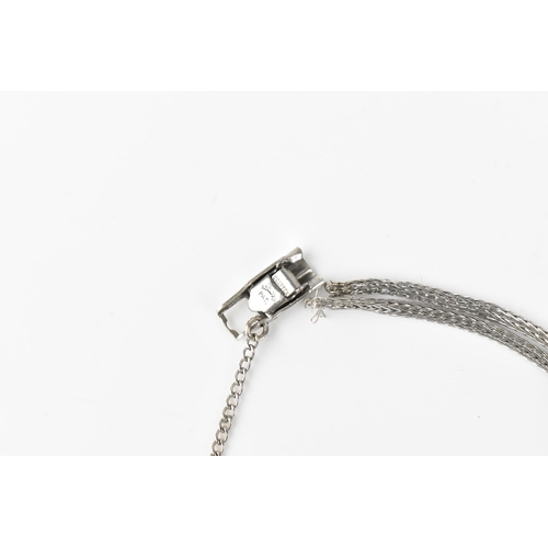 60 - A Filippe Girard manual wind, ladies 14k stamped white gold cased wristwatch inset with 24 diamonds,... 