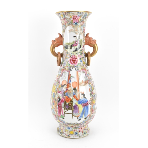 1 - A large Chinese Famille Rose baluster vase, Republic Period, decorated to the body with central figu... 