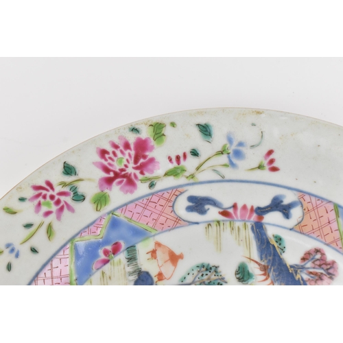 10 - Two Chinese 18th century Famille Rose plates, one Yongzheng, the other Qianlong, the former of circu... 