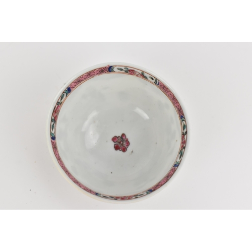 14 - Two Chinese Famille Rose tea bowls, 18th century, Yongzheng/Qianlong period, with enamelled rim, the... 