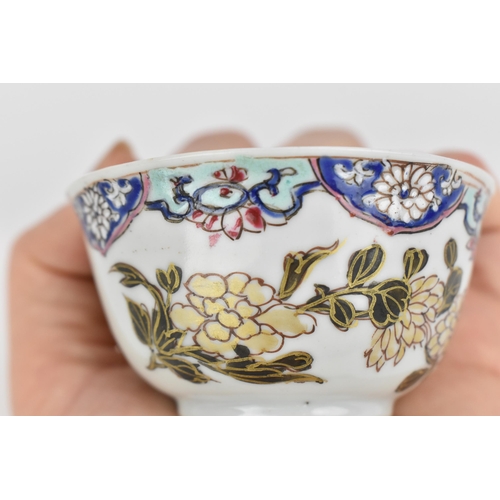 14 - Two Chinese Famille Rose tea bowls, 18th century, Yongzheng/Qianlong period, with enamelled rim, the... 