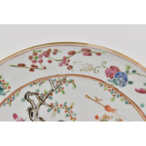 15 - A Chinese export 'Famille Rose' porcelain plate, 18th century, Qianlong period, depicting a central ... 