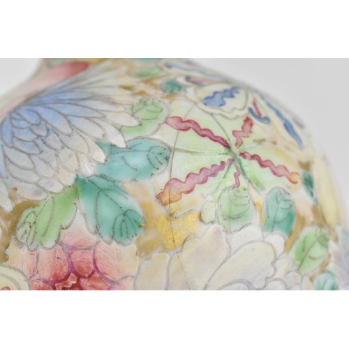 20 - A Chinese mille fleurs vase, Republic period, of ovoid shape decorated with large blooms and foliage... 