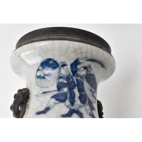 21 - A pair of Chinese blue and white crackle glazed porcelain vases, late 19th century/turn of century, ... 