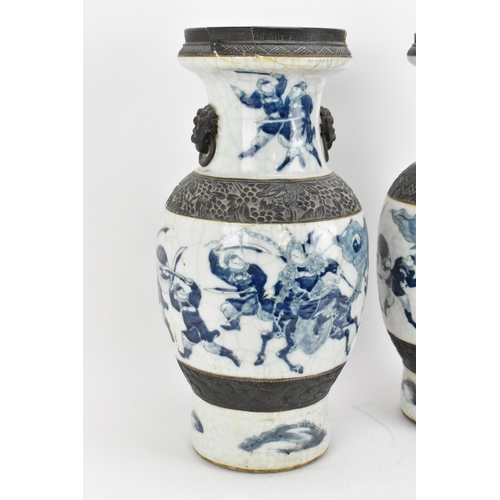 21 - A pair of Chinese blue and white crackle glazed porcelain vases, late 19th century/turn of century, ... 