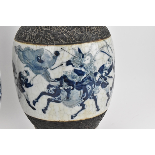 21 - A pair of Chinese blue and white crackle glazed porcelain vases, late 19th century/turn of century, ... 