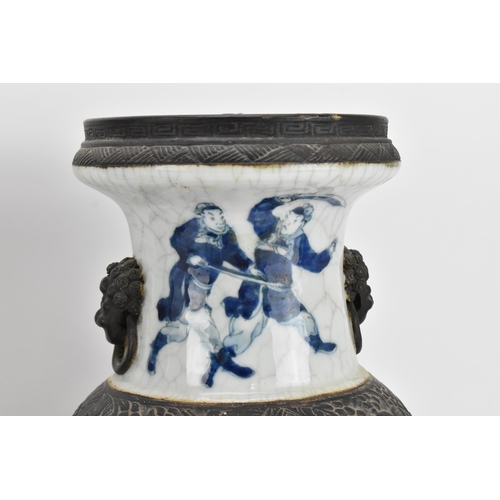 21 - A pair of Chinese blue and white crackle glazed porcelain vases, late 19th century/turn of century, ... 