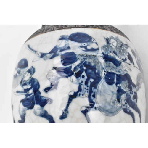 21 - A pair of Chinese blue and white crackle glazed porcelain vases, late 19th century/turn of century, ... 