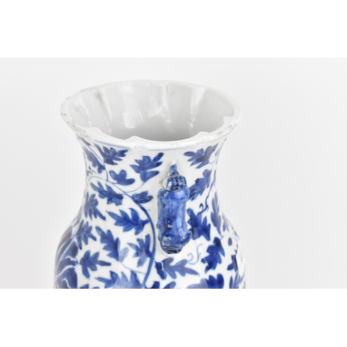 23 - A Chinese blue and white porcelain vase, 20th century, the body decorated with foliage throughout, t... 