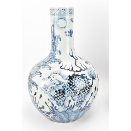 4 - A large pair of Chinese blue and white tianqiuping vases, 19th century, late Qing dynasty, the body ... 