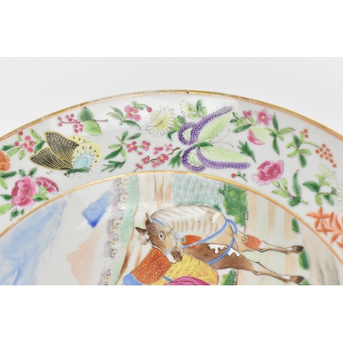 9 - A Chinese Famille Rose plate, Qianlong/Jiaqing period, late 18th/early 19th century, depicting a nob... 