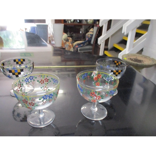 252 - A quantity of cut table glass to include a claret jug, four early 20th century enamelled glasses, po... 