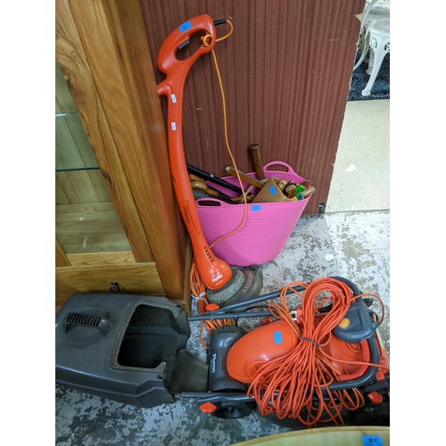 253 - A Flymo Easimo electric lawnmower with grass basket, a Flymo Contour strimmer and a quantity of gard... 