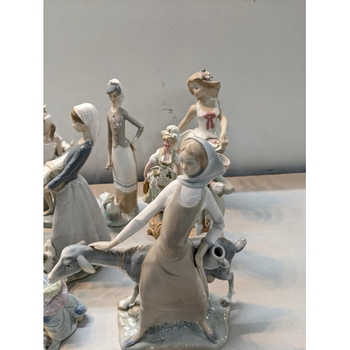 265 - A small quantity of mixed ornaments to include a Lladro figurine of a ballerina and others 
Location... 