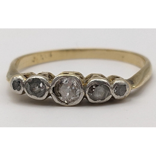 267 - A yellow metal ring inset with five diamonds, 2.1g
Location: CAB 1