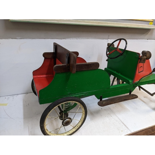 192 - A child's vintage scratch built peddle car with spoked wheels
Location: G