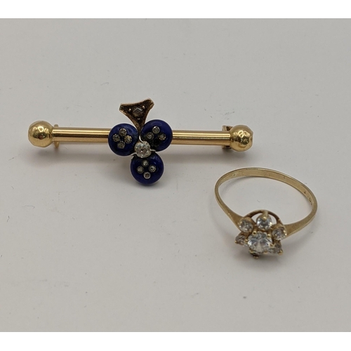 193 - A yellow metal bar brooch, the centre decorated with lapis lazuli and inset with old cut diamonds, t... 