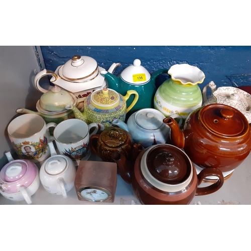 135 - Mixed 20th century household items to include China, teapots and a pink glass framed bedside clock. ... 