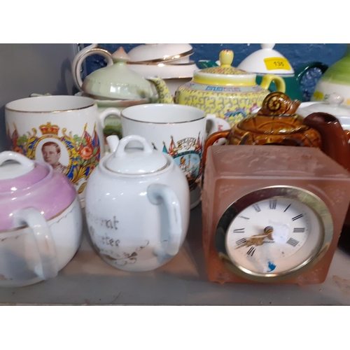 135 - Mixed 20th century household items to include China, teapots and a pink glass framed bedside clock. ... 