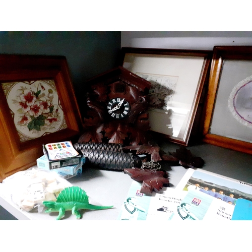 41 - Mixed items to include a small quantity of 45rpm records, a print of Henley, games, framed tiles, a ... 