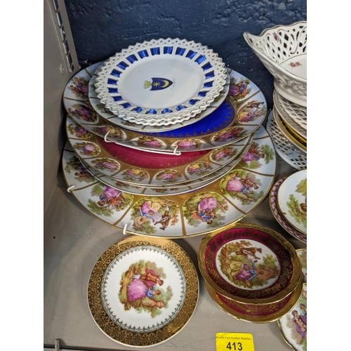 413 - A collection of decorative wall plates to include Bavarian style and Limoges and others
Location: 7.... 