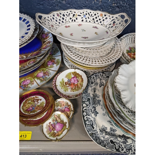 413 - A collection of decorative wall plates to include Bavarian style and Limoges and others
Location: 7.... 