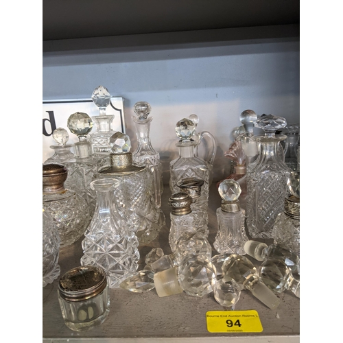 94 - Approximately 40 cut glass perfume bottles and jars
Location: 4:2