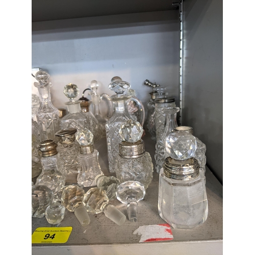 94 - Approximately 40 cut glass perfume bottles and jars
Location: 4:2