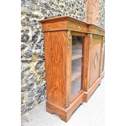 421 - A 19th century ormolu-mounted burr walnut breakfront credenza, set with KPM style plaques, the mould... 