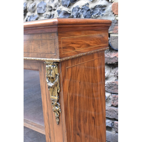 421 - A 19th century ormolu-mounted burr walnut breakfront credenza, set with KPM style plaques, the mould... 