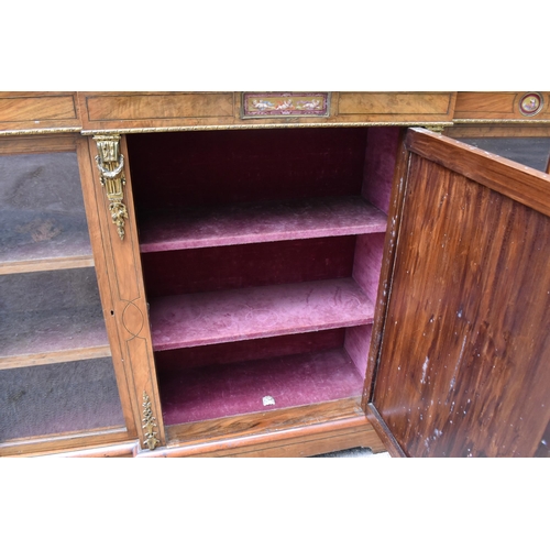 421 - A 19th century ormolu-mounted burr walnut breakfront credenza, set with KPM style plaques, the mould... 