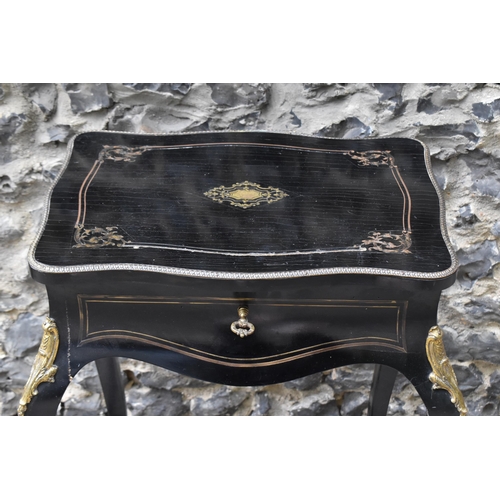 424 - A Napoleon III ormolu mounted ebonised dressing table, in the Louis XV style with brass inlaid top a... 