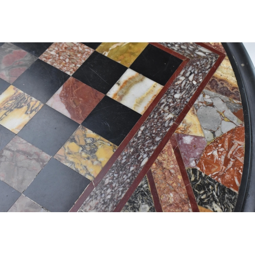 429 - A Victorian specimen marble topped occasional table, of circular form with chequered black marble co... 